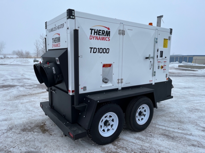 closer view of the TD1000 flameless heater designed for the oil and gas industry and energy industry sitting in a parking lot in the winter